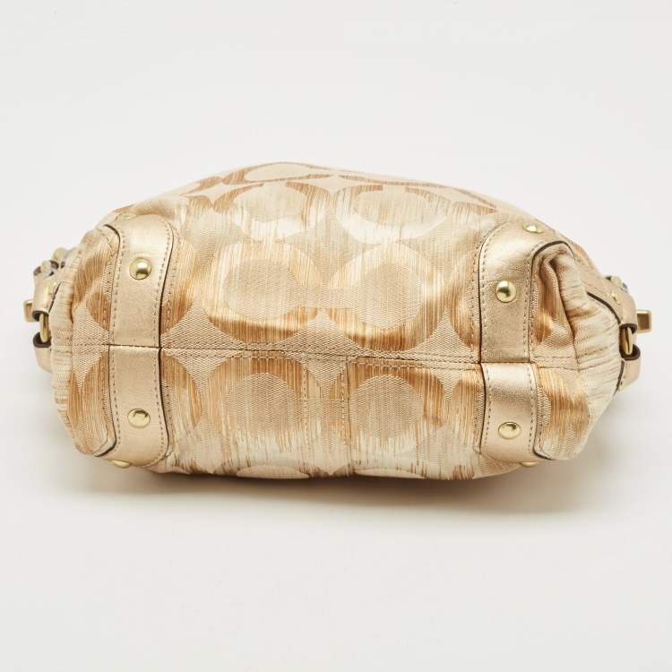 Pre Owned Coach Gold Signature Canvas and Leather Carly Hobo