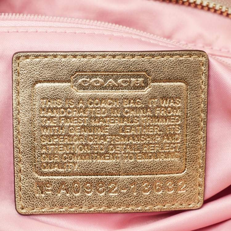 Pre Owned Coach Gold Signature Canvas and Leather Carly Hobo