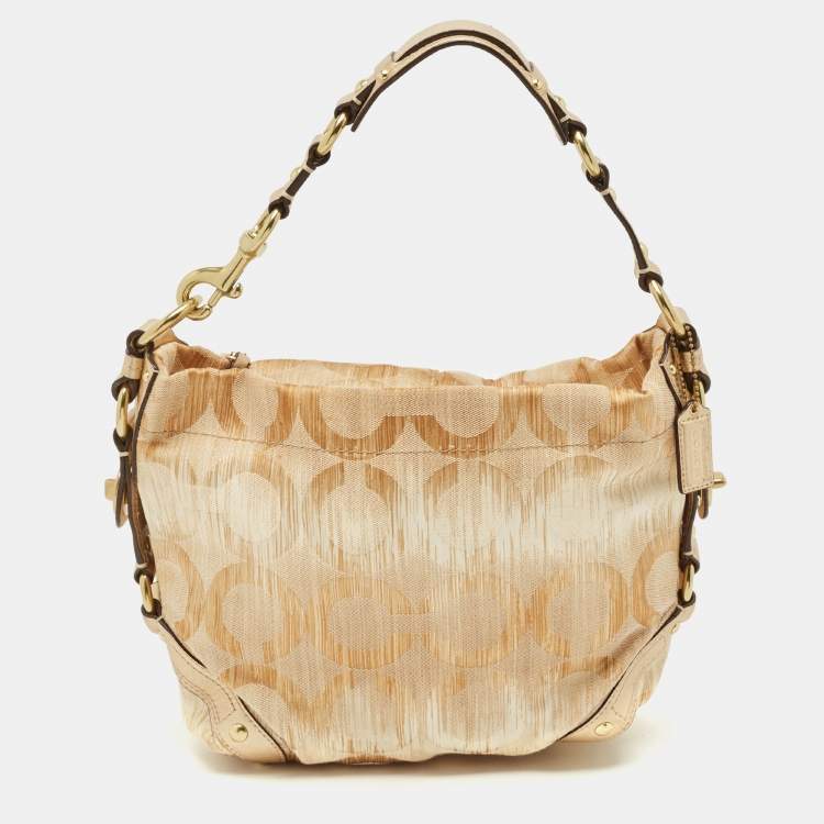Pre Owned Coach Gold Signature Canvas and Leather Carly Hobo
