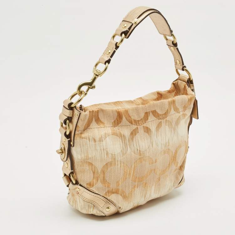 Pre Owned Coach Gold Signature Canvas and Leather Carly Hobo
