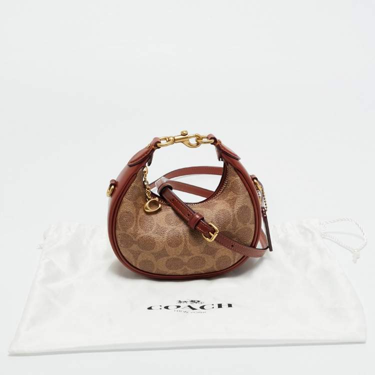 Pre Owned Coach Brown/Beige Signature Coated Canvas Jonie Crossbody Bag