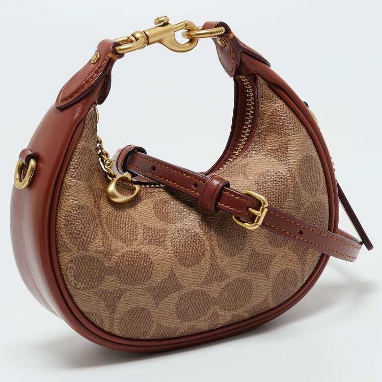 Pre Owned Coach Brown/Beige Signature Coated Canvas Jonie Crossbody Bag