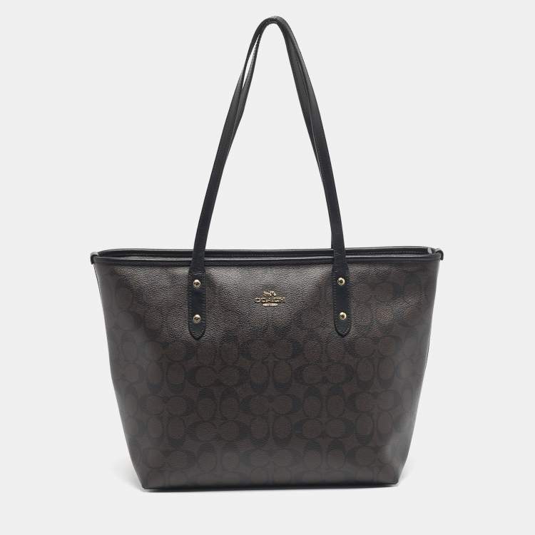 Pre Owned Coach Black/Dark Brown Signature Coated Canvas and Leather City Zip Tote