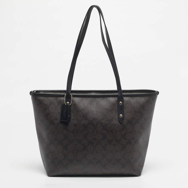 Pre Owned Coach Black/Dark Brown Signature Coated Canvas and Leather City Zip Tote