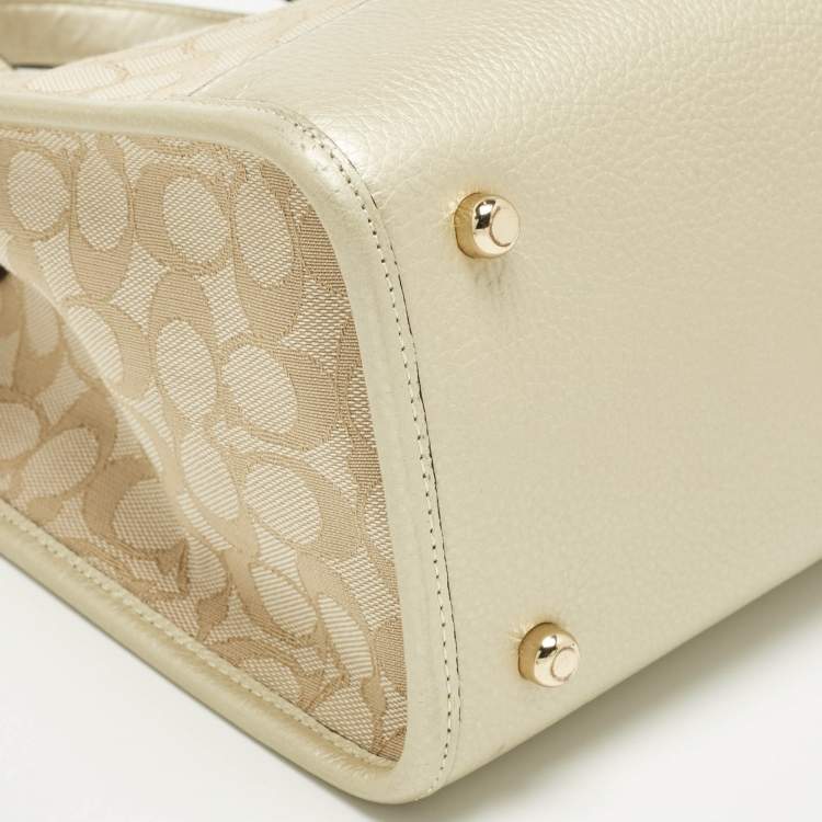 Pre Owned Coach Pale Gold/Beige Signature Jacquard Canvas Dempsey 30 Carryall Tote