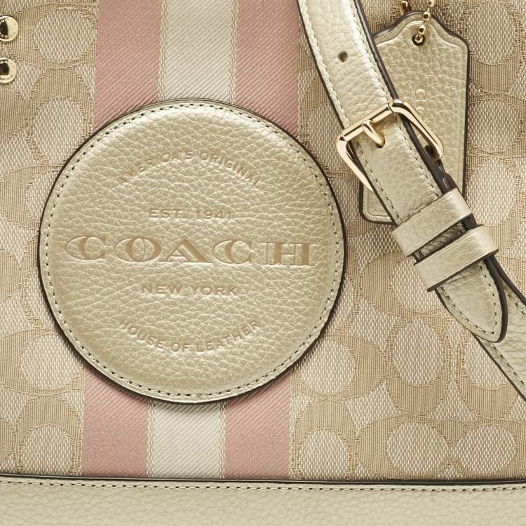 Pre Owned Coach Pale Gold/Beige Signature Jacquard Canvas Dempsey 30 Carryall Tote