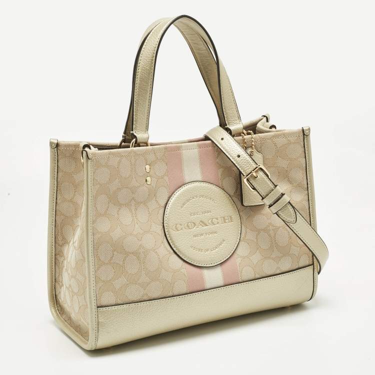 Pre Owned Coach Pale Gold/Beige Signature Jacquard Canvas Dempsey 30 Carryall Tote