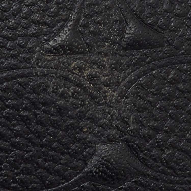 Pre Owned Coach Black Signature Embossed Leather Zip Wristlet