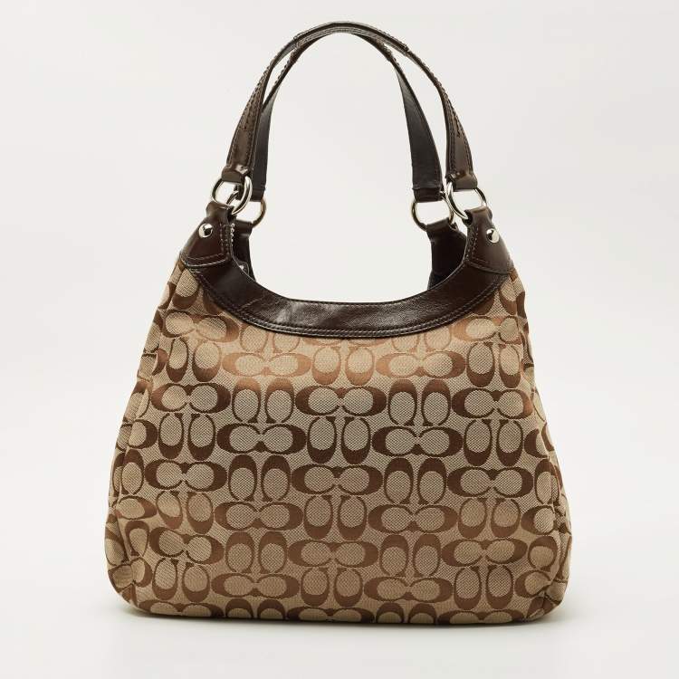 Pre Owned Coach Beige/Brown Signature Canvas and Leather Soho Lynn Hobo