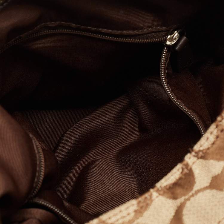 Pre Owned Coach Beige/Brown Signature Canvas and Leather Soho Lynn Hobo