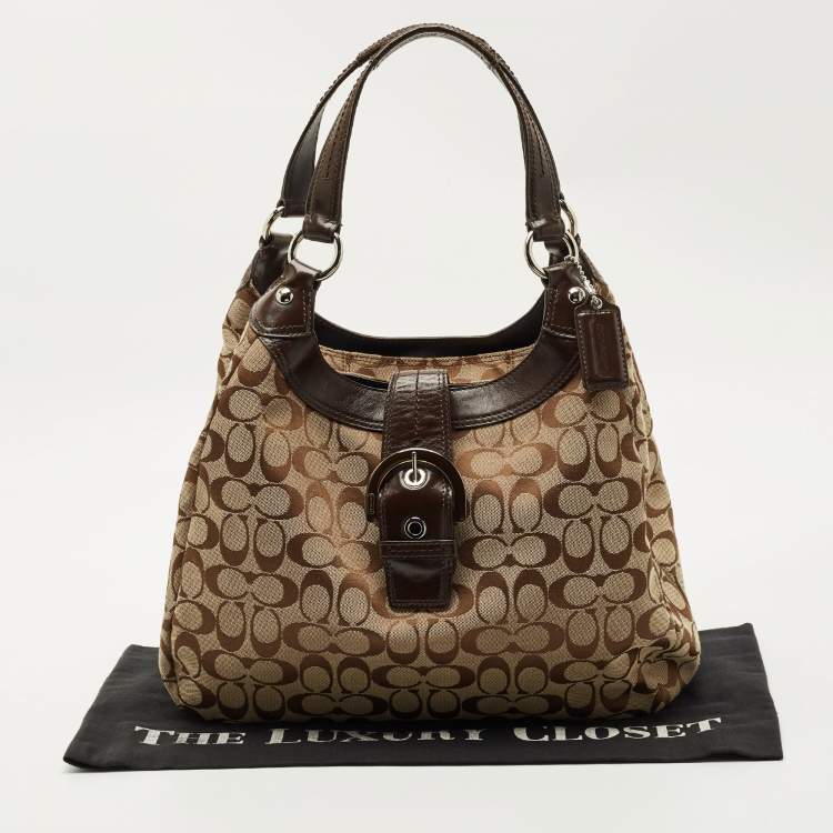 Pre Owned Coach Beige/Brown Signature Canvas and Leather Soho Lynn Hobo