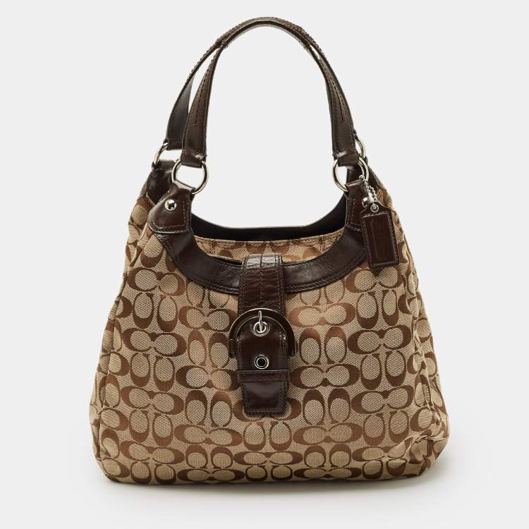 Pre Owned Coach Beige/Brown Signature Canvas and Leather Soho Lynn Hobo