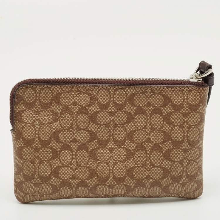 Pre Owned Coach Beige Signature Coated Canvas Lip Corner Wristlet Pouch