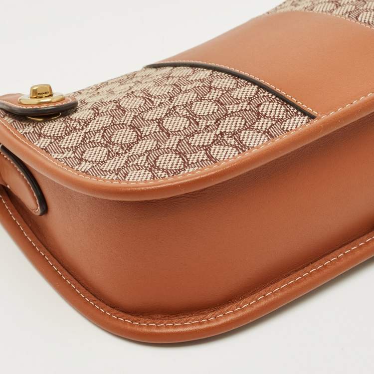 Pre Owned Coach Brown Signature Jacquard Canvas Swinger 23 Shoulder Bag