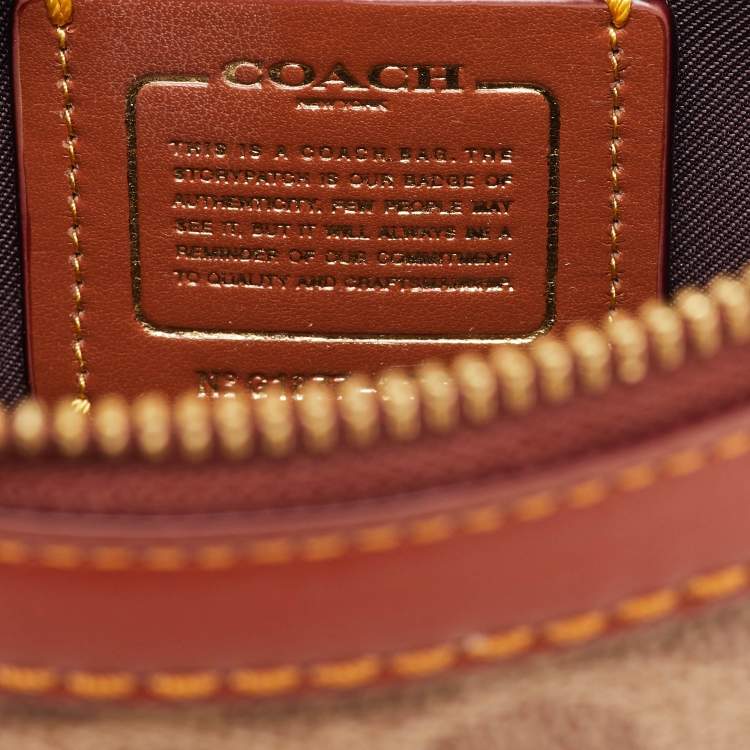 Pre Owned Coach Beige/Brown Signature Coated Canvas and Leather Trail Top Handle Bag