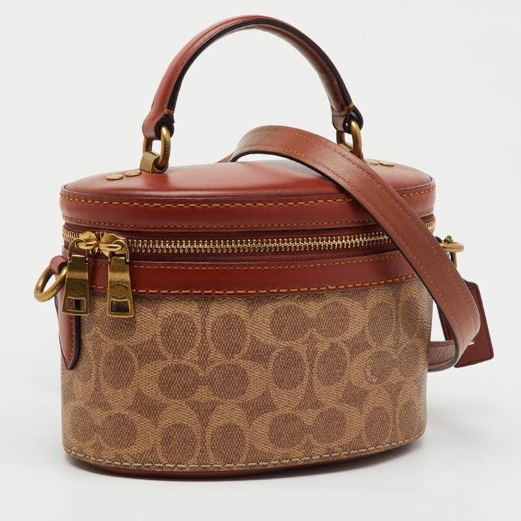 Pre Owned Coach Beige/Brown Signature Coated Canvas and Leather Trail Top Handle Bag
