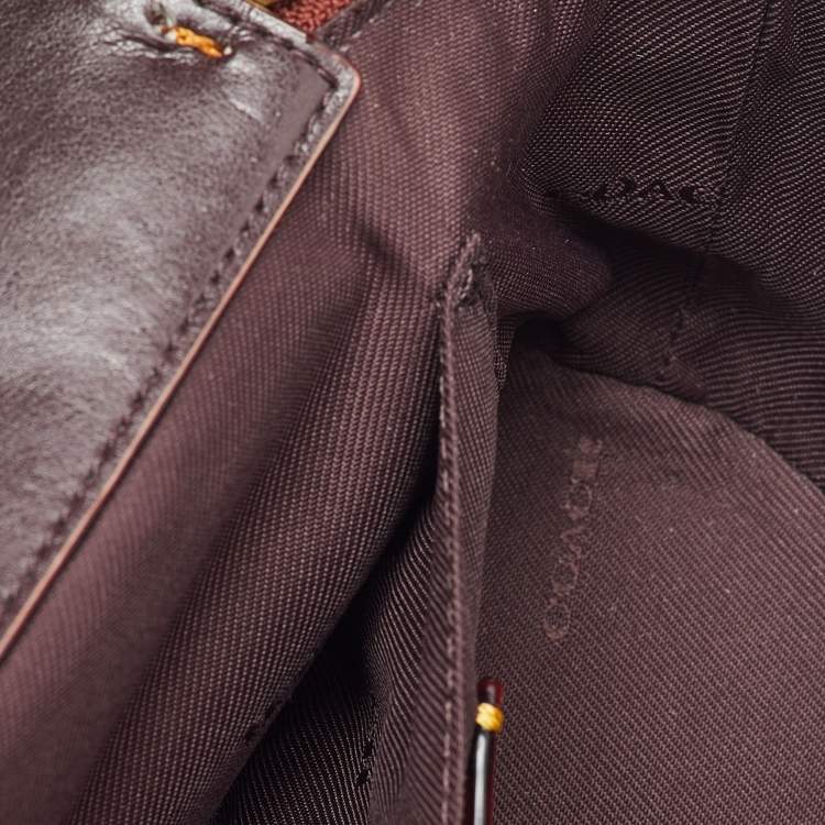 Pre Owned Coach Beige/Brown Signature Coated Canvas and Leather Trail Top Handle Bag