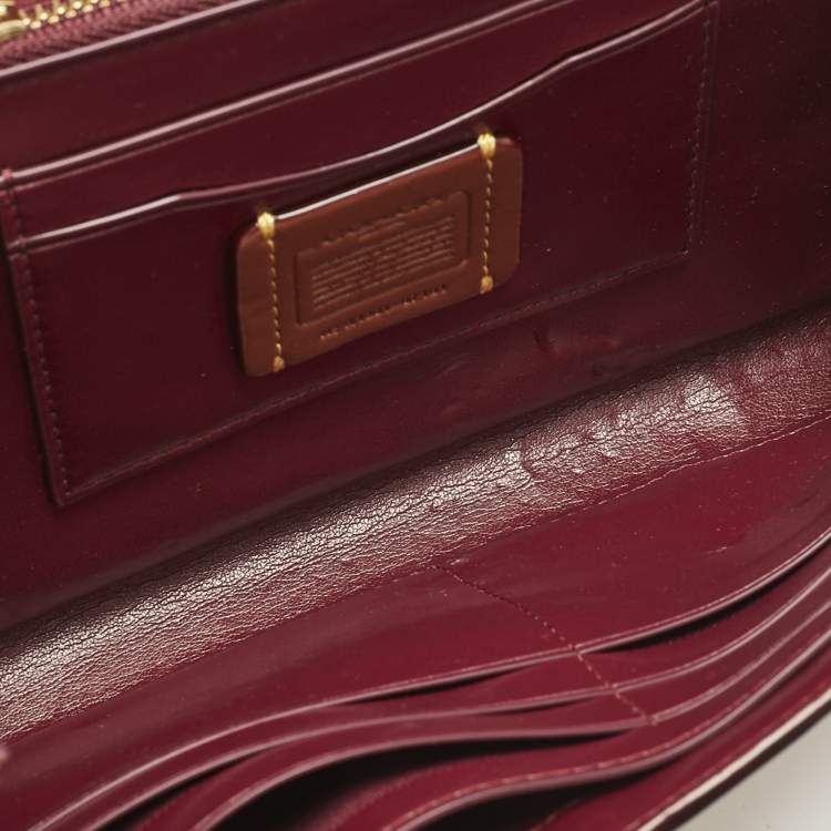 Pre Owned Coach Brown/Beige Signature Coated Canvas and Leather Marlow Clutch Bag