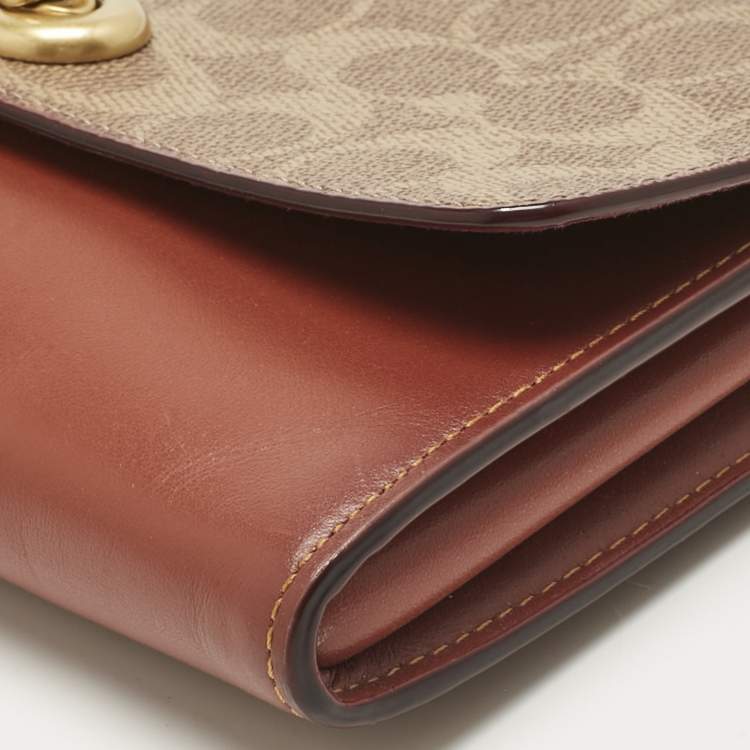 Pre Owned Coach Brown/Beige Signature Coated Canvas and Leather Marlow Clutch Bag