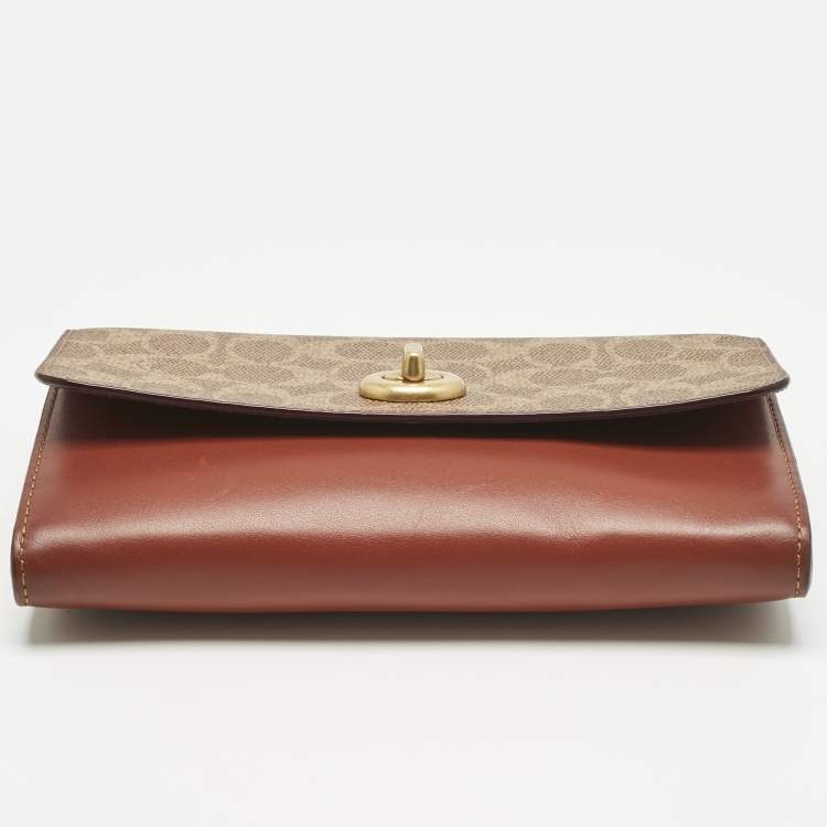 Pre Owned Coach Brown/Beige Signature Coated Canvas and Leather Marlow Clutch Bag