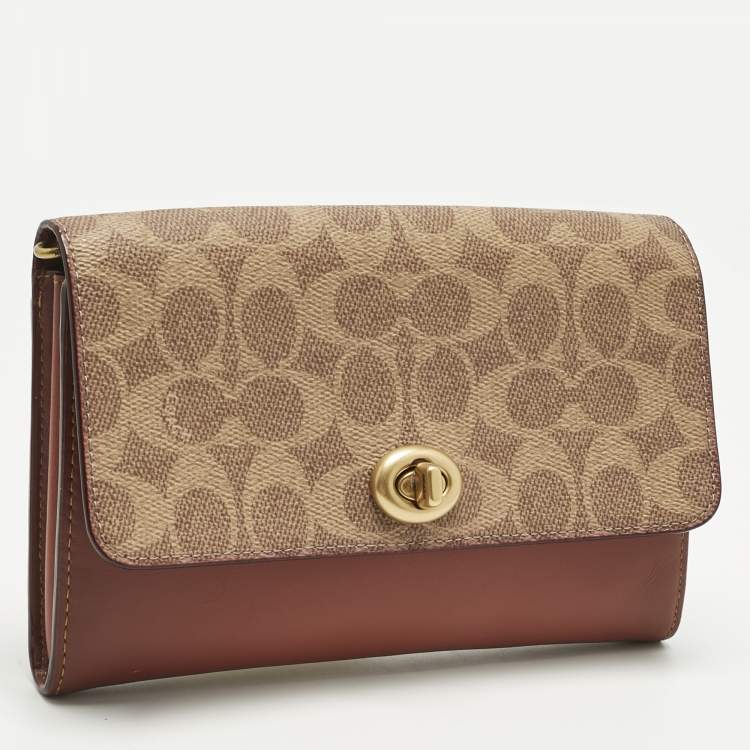 Pre Owned Coach Brown/Beige Signature Coated Canvas and Leather Marlow Clutch Bag