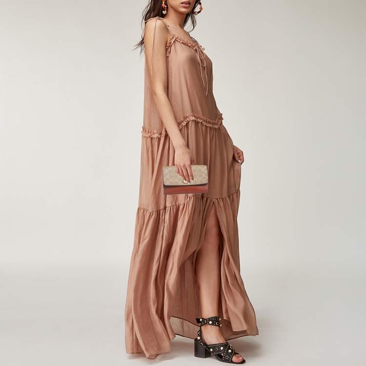 Pre Owned Coach Brown/Beige Signature Coated Canvas and Leather Marlow Clutch Bag