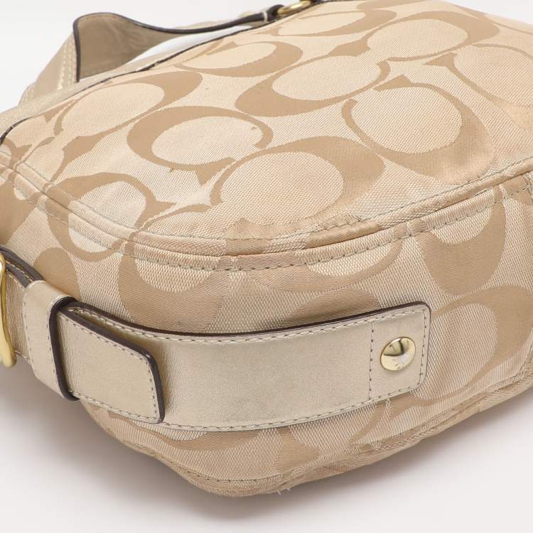 Pre Owned Coach Beige/Gold Canvas and Leather Zoe Hobo
