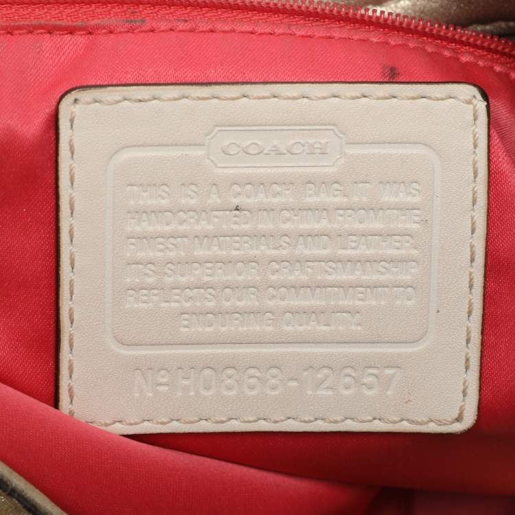 Pre Owned Coach Beige/Gold Canvas and Leather Zoe Hobo