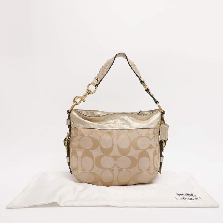 Pre Owned Coach Beige/Gold Canvas and Leather Zoe Hobo