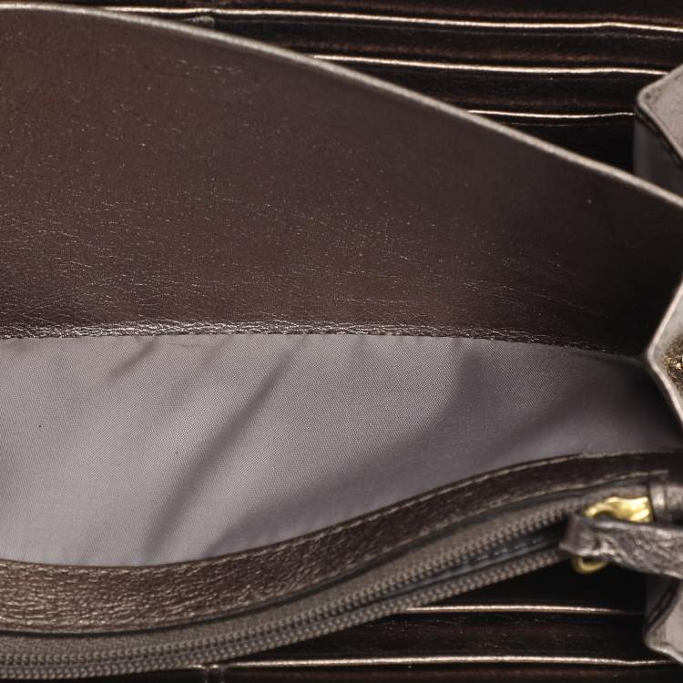 مملوكة مسبقًا محفظة كوتش جلد أسود بسحّاب محيط