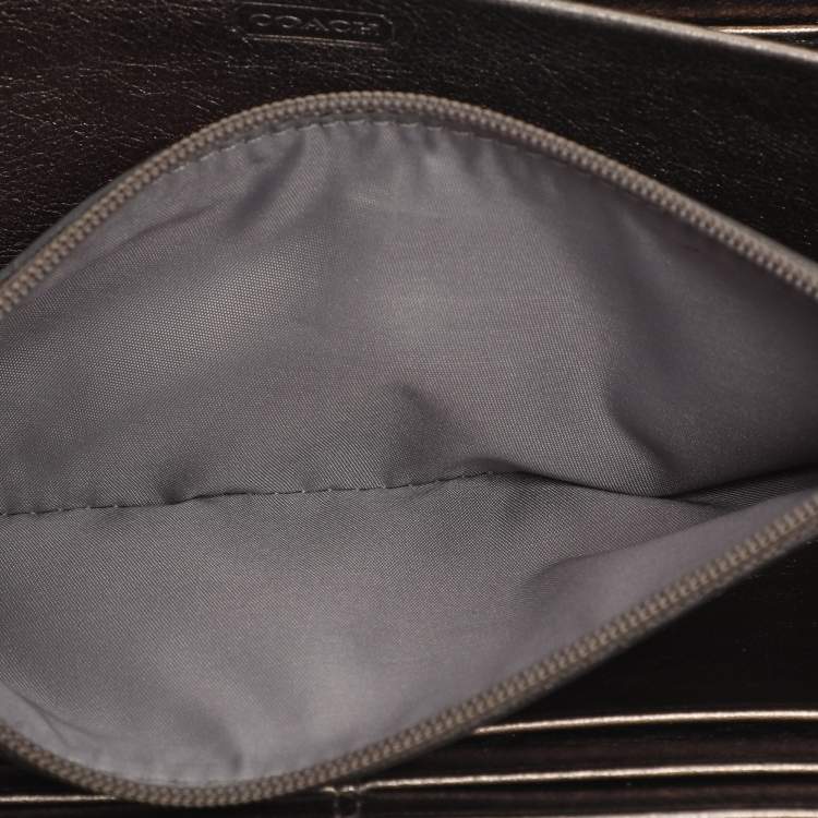 مملوكة مسبقًا محفظة كوتش جلد أسود بسحّاب محيط