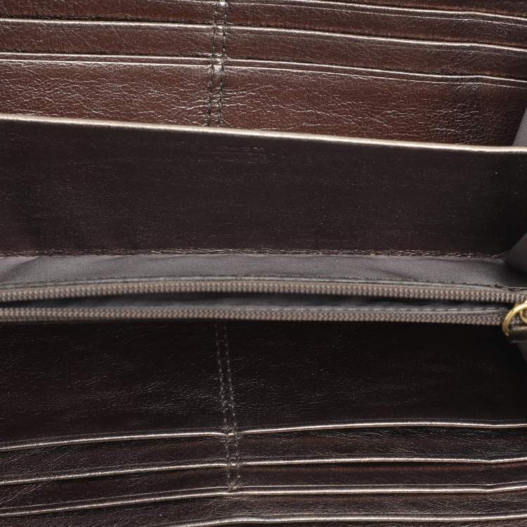 مملوكة مسبقًا محفظة كوتش جلد أسود بسحّاب محيط