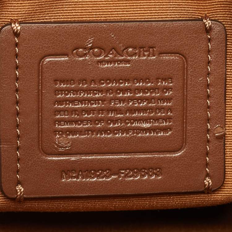 Pre Owned Coach Beige Signature Coated Canvas and Leather Sage Carryall Satchel