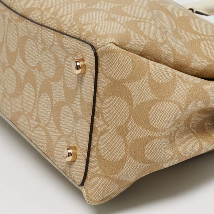 Pre Owned Coach Beige Signature Coated Canvas and Leather Sage Carryall Satchel