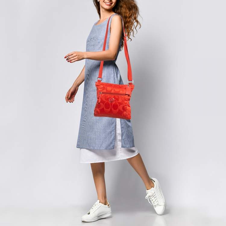 Pre Owned Coach Orange Signature Nylon File Messenger Bag