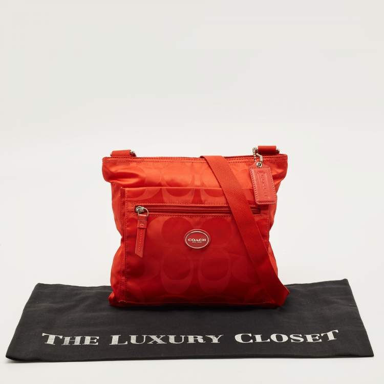 Pre Owned Coach Orange Signature Nylon File Messenger Bag