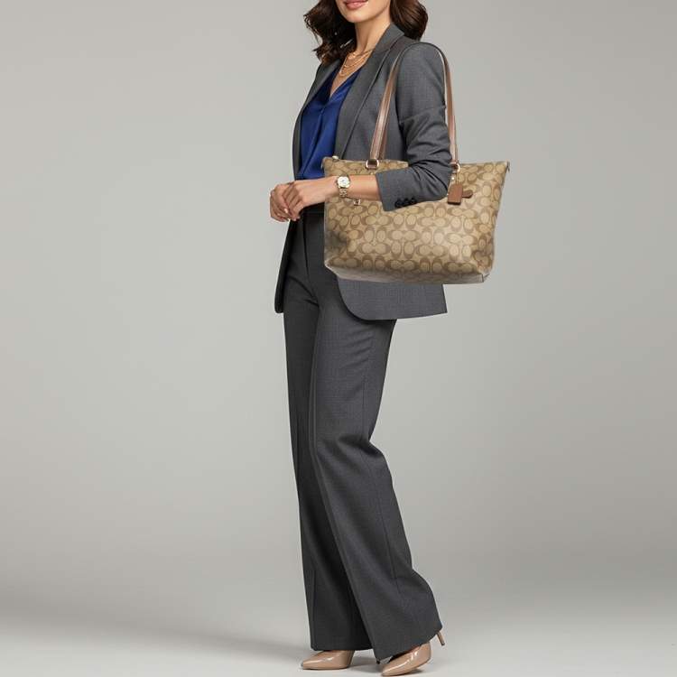 Pre Owned Coach Gallery Beige/Brown Signature Coated Canvas and Leather Tote