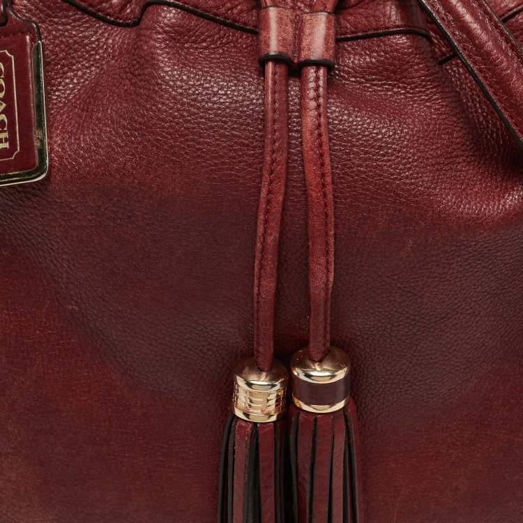 مملوكة مسبقًا حقيبة كتف كوتش جلد أحمر بخيط ماكدسون