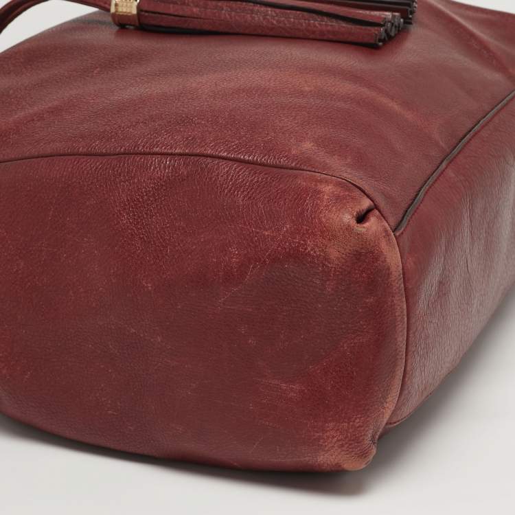 مملوكة مسبقًا حقيبة كتف كوتش جلد أحمر بخيط ماكدسون