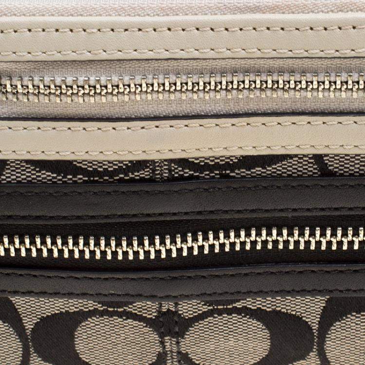 Pre Owned Coach Beige/Black Canvas and Leather Clutch