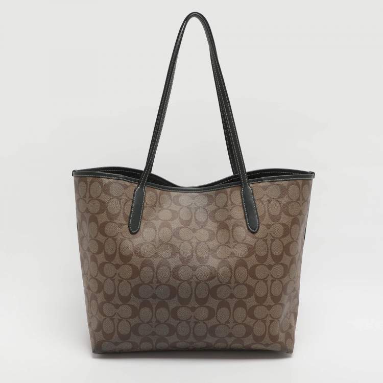 Pre Owned Coach Variety City Beige Signature Coated Canvas Shopper Tote