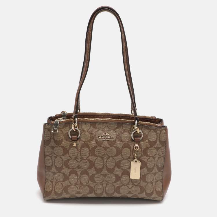 Pre Owned Coach Etta Carryall Beige/Brown Signature Coated Canvas and Leather Satchel