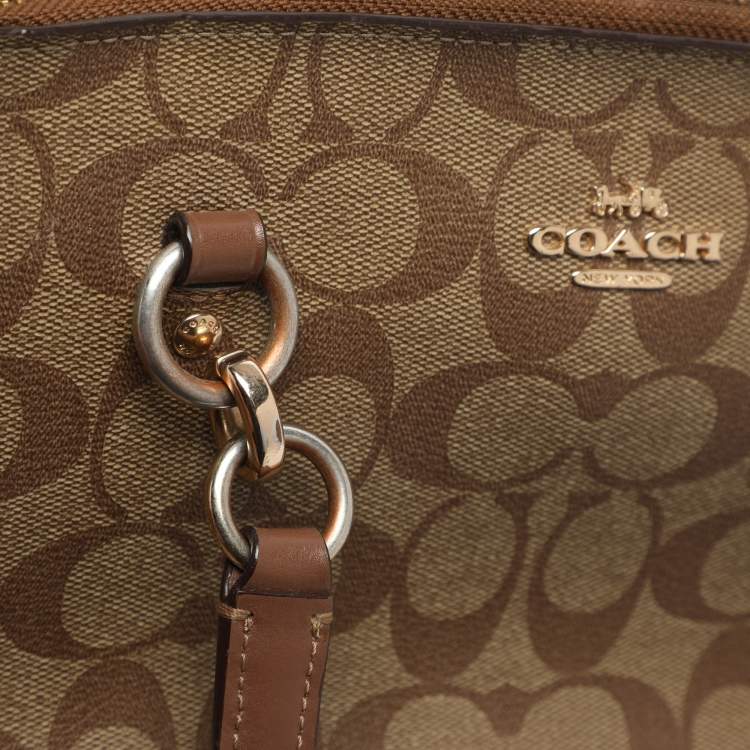 Pre Owned Coach Etta Carryall Beige/Brown Signature Coated Canvas and Leather Satchel