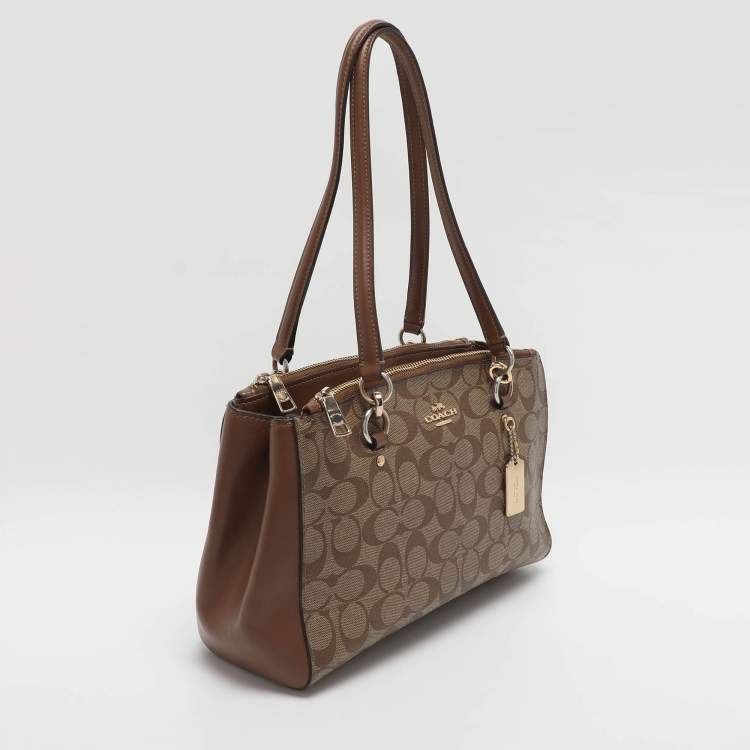 Pre Owned Coach Etta Carryall Beige/Brown Signature Coated Canvas and Leather Satchel