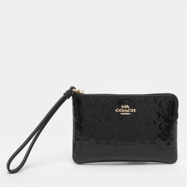 Pre Owned Coach Black Signature Debossed Patent Leather Wristlet