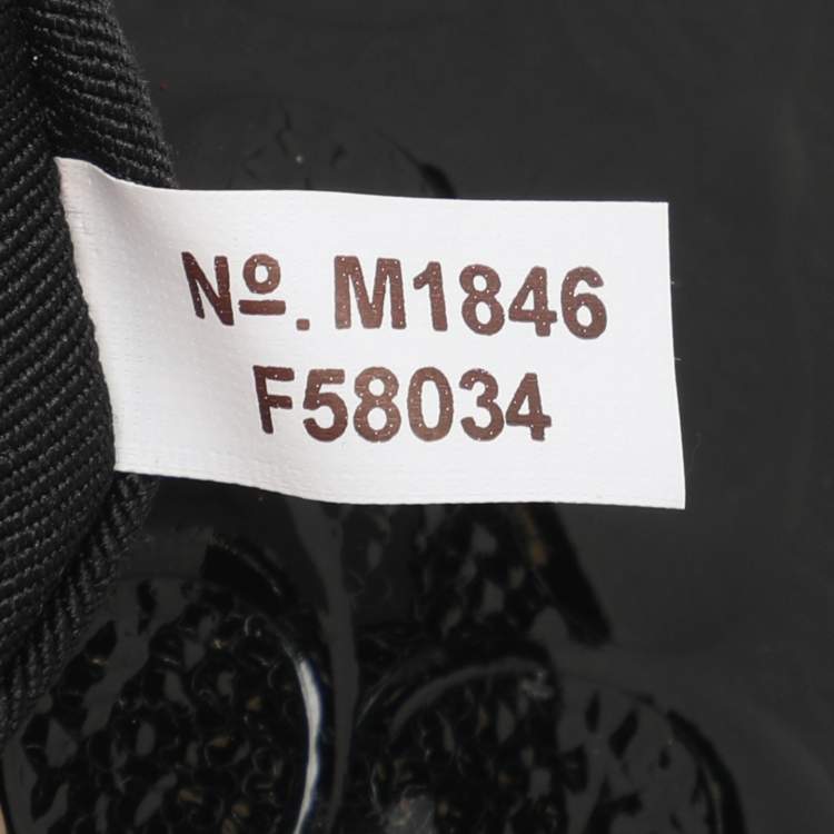 Pre Owned Coach Black Signature Debossed Patent Leather Wristlet