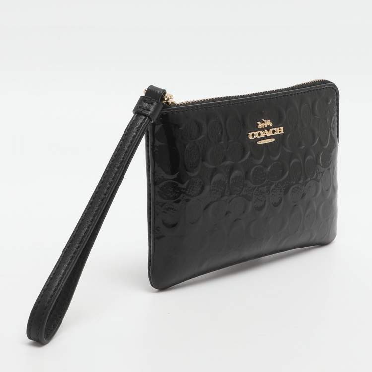 Pre Owned Coach Black Signature Debossed Patent Leather Wristlet