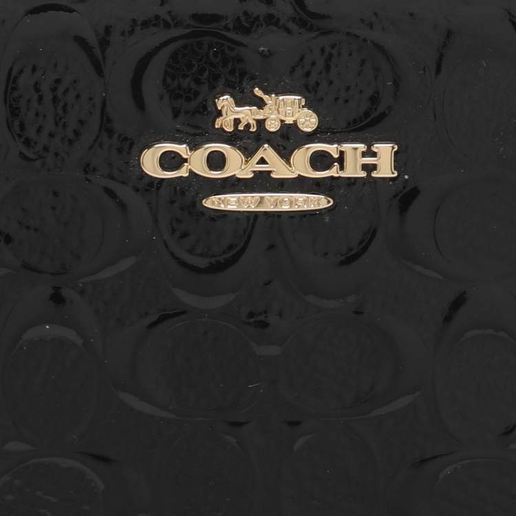 Pre Owned Coach Black Signature Debossed Patent Leather Wristlet