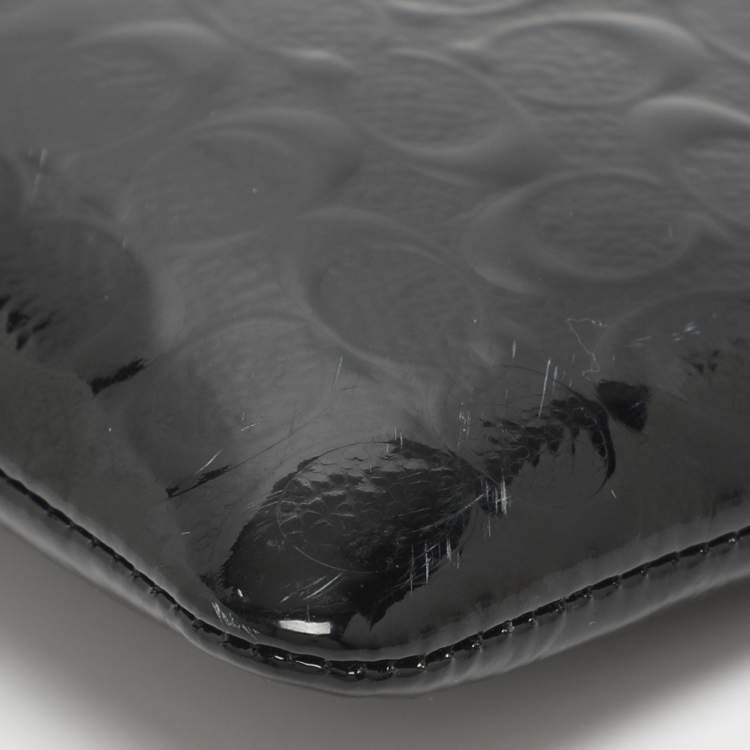 Pre Owned Coach Black Signature Debossed Patent Leather Wristlet