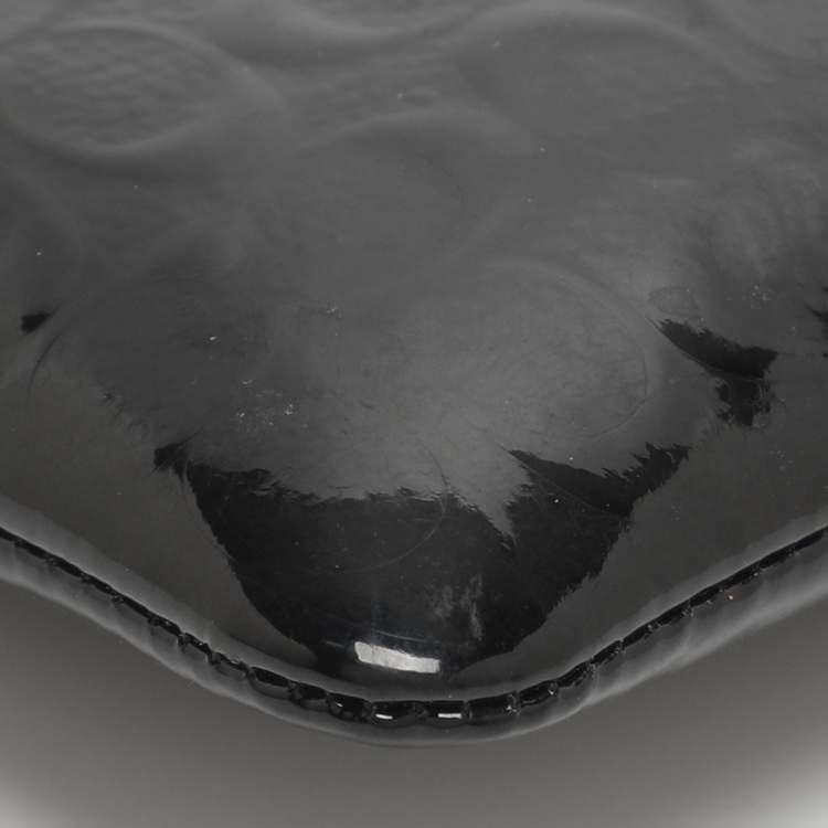 Pre Owned Coach Black Signature Debossed Patent Leather Wristlet